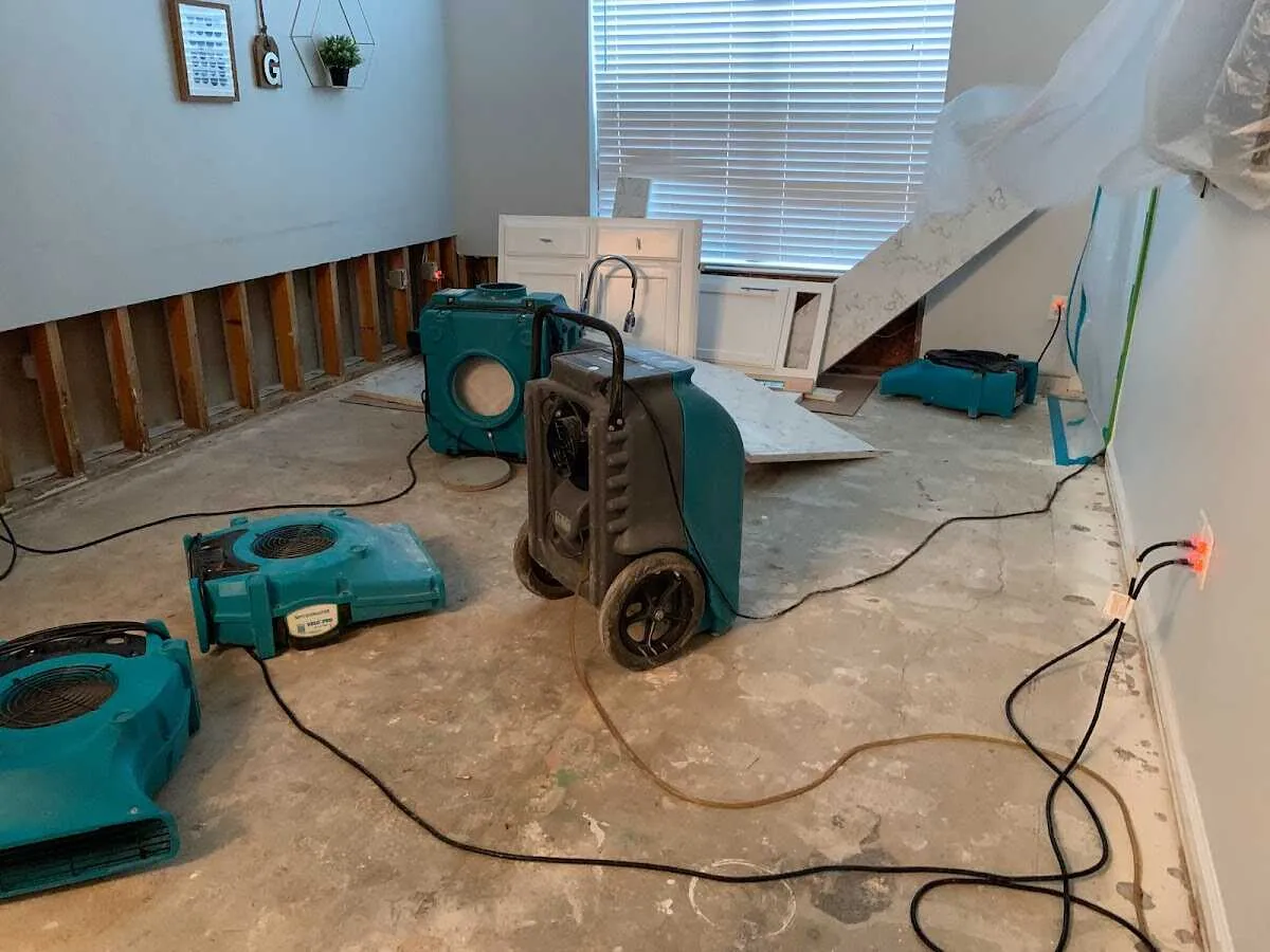 Dehumidifier in flood-cut room for Water Damage Restoration in Nixa